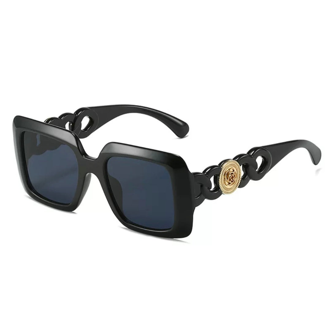 Square Sunglasses – Black Frame with Gold Medallion Chain Temple | Influencer Street Style
