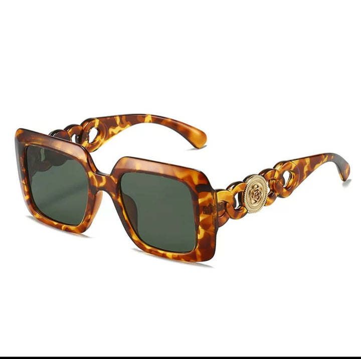 Square Sunglasses – Black Frame with Gold Medallion Chain Temple | Influencer Street Style